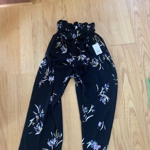 Black print flowing bell bottom pants